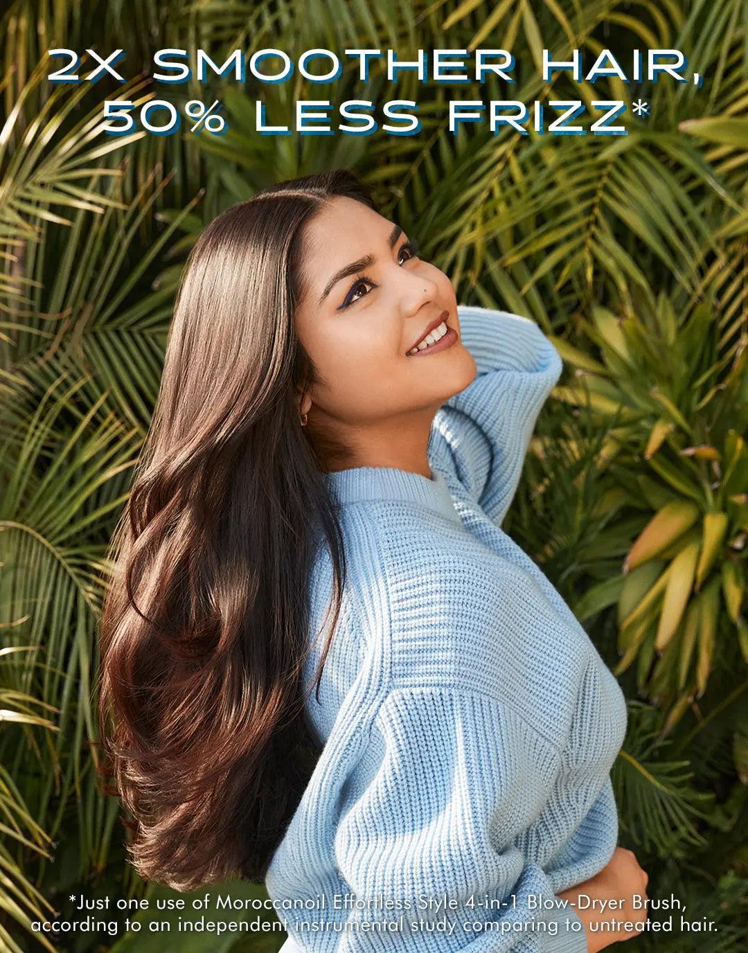 Smiling woman with long, smooth hair, showcasing the benefits of a 4-in-1 Blow-Dryer Brush for shiny, frizz-free styling.