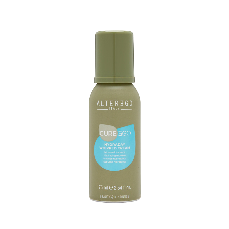 Whipped cream hair product in a green bottle, perfect for improving hydration and shine for all hair types.