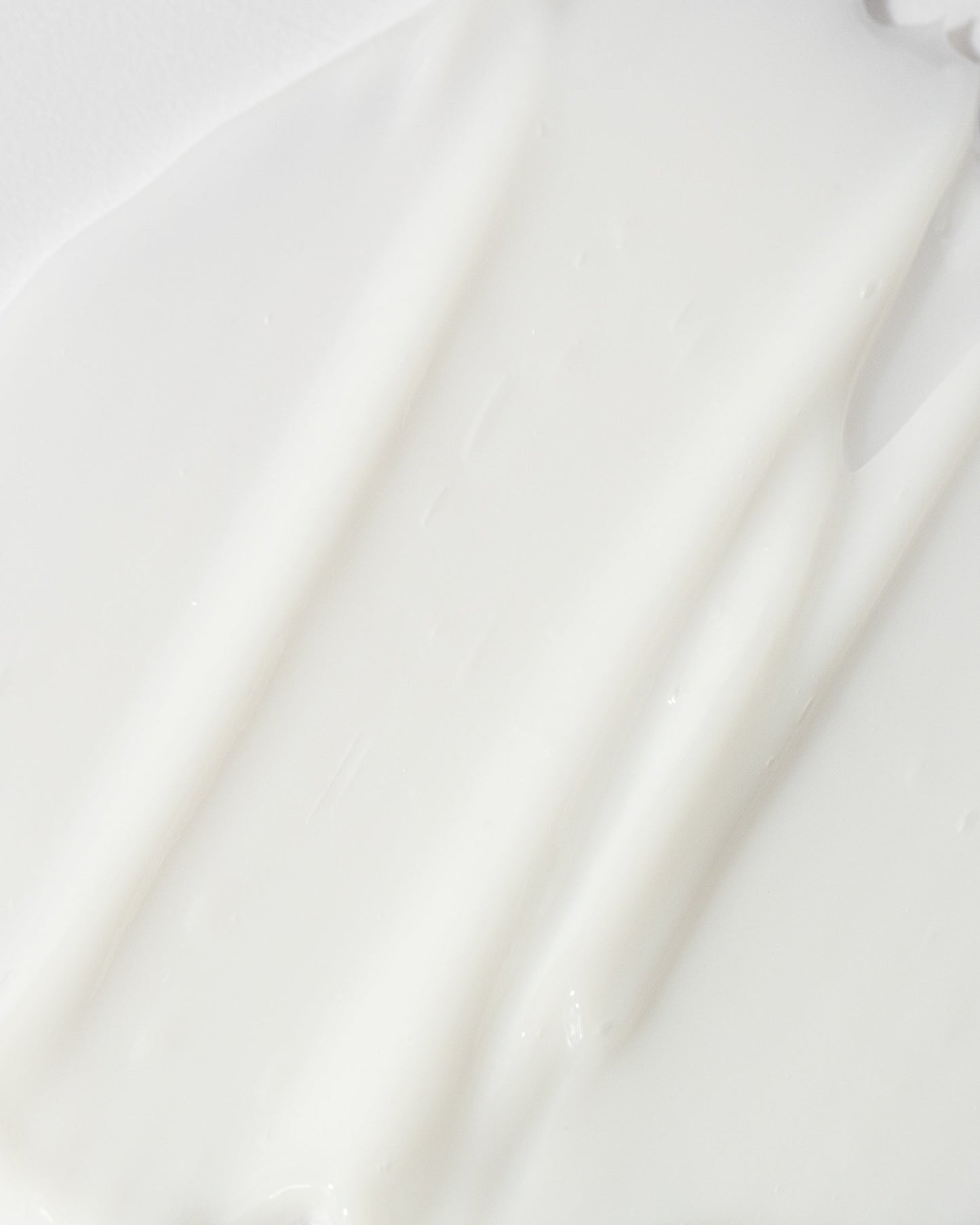 Smooth, creamy texture of Vivier Exfoliant Forte lotion with Alpha Hydroxy Acids for skin exfoliation.