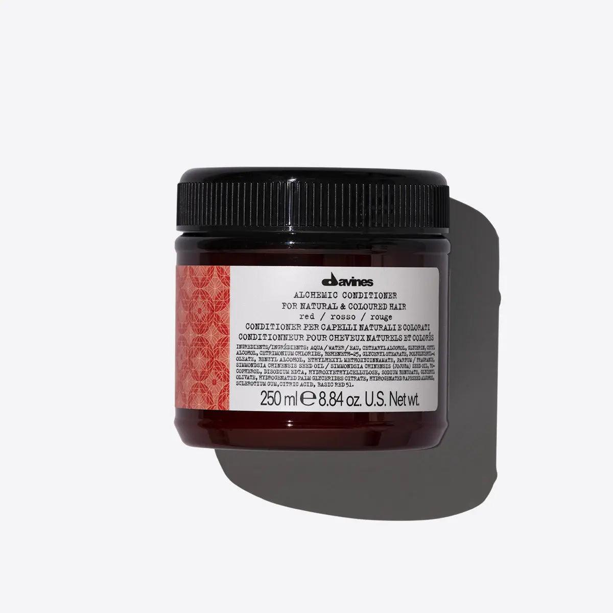 Alchemic Conditioner Red from Davines, 250ml jar for color-enhancing cool red tones on damp hair.