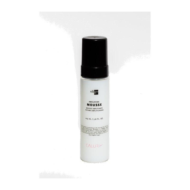 Amplifying Mousse bottle for ultra-light volume, flexible hold, heat protection, and frizz control. 175 ml.
