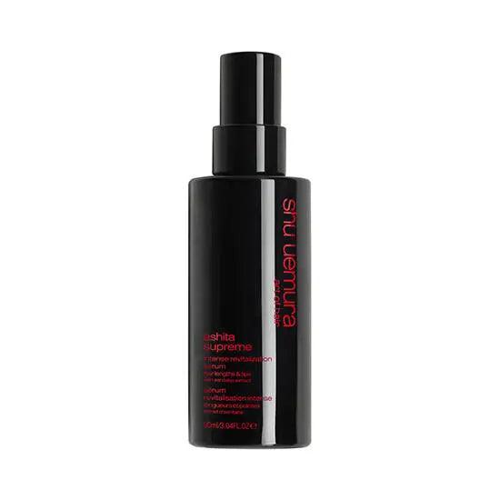 Shu Uemura Ashita Supreme Serum bottle for nourishing dry, damaged hair, suitable for all hair types.