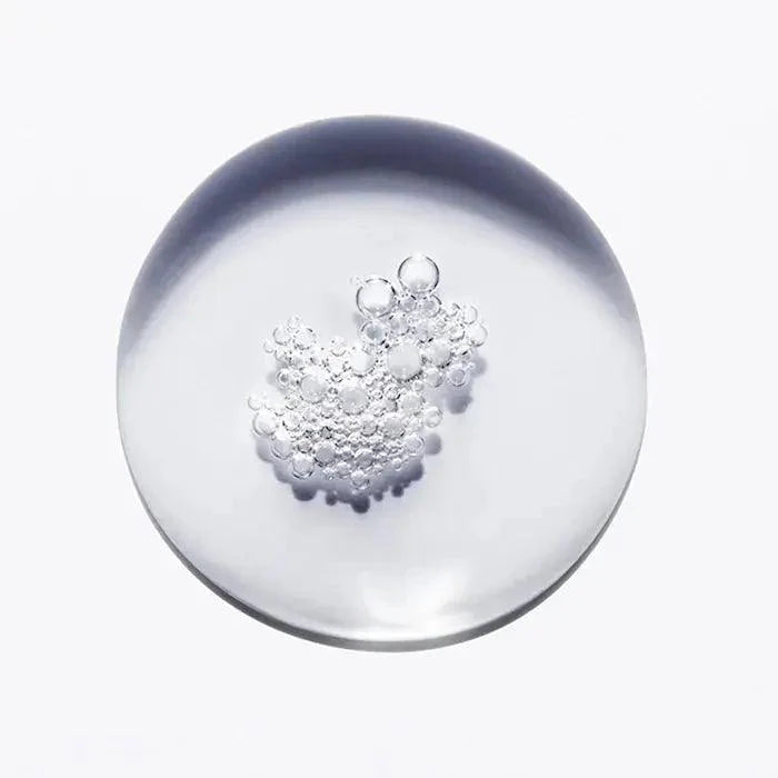 Clear round gel beads in a transparent bowl on a white background.