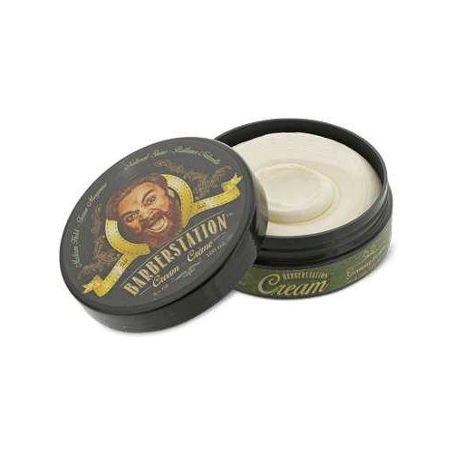 Barberstation Cream water-based wax in a black container, offering medium hold and natural shine for textured hair.