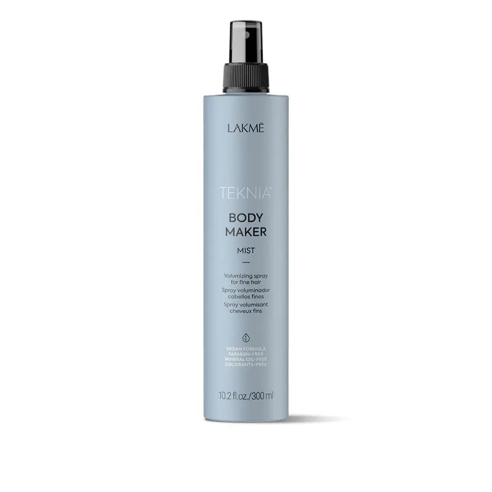 Lakmé Teknia Body Maker Mist in a sleek blue bottle, offering lightweight volume and natural hold with herbal fragrance.