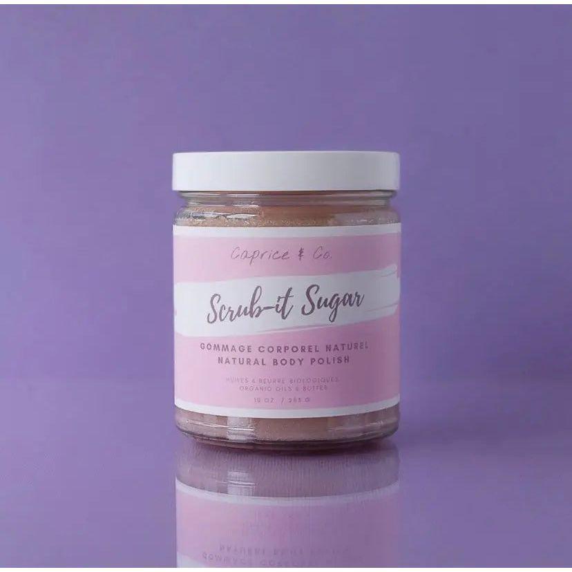 Natural sugar body scrub jar with pink label, featuring Scrub-it-Sugar, perfect for exfoliating and hydrating skin.
