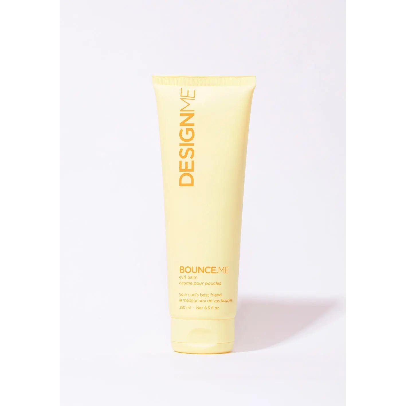 DESIGNME Bounce Me Curl Balm 8.5 oz in a yellow tube for curly hair care.