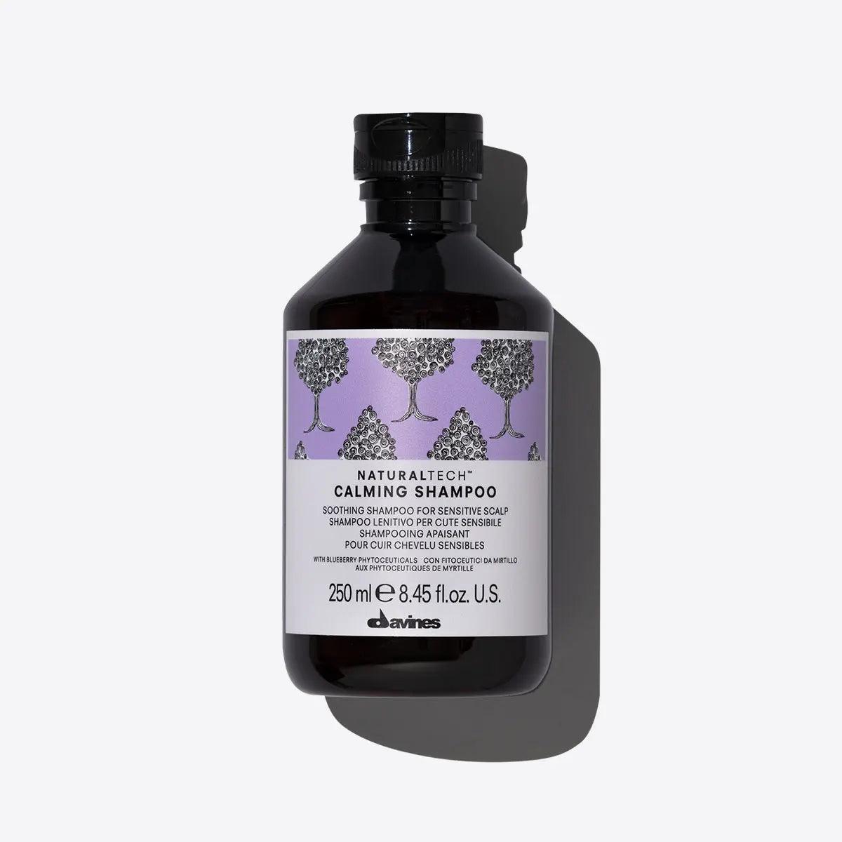 Davines Calming Shampoo bottle with label, 250 ml, designed for sensitive scalps, soothing formula with natural ingredients.