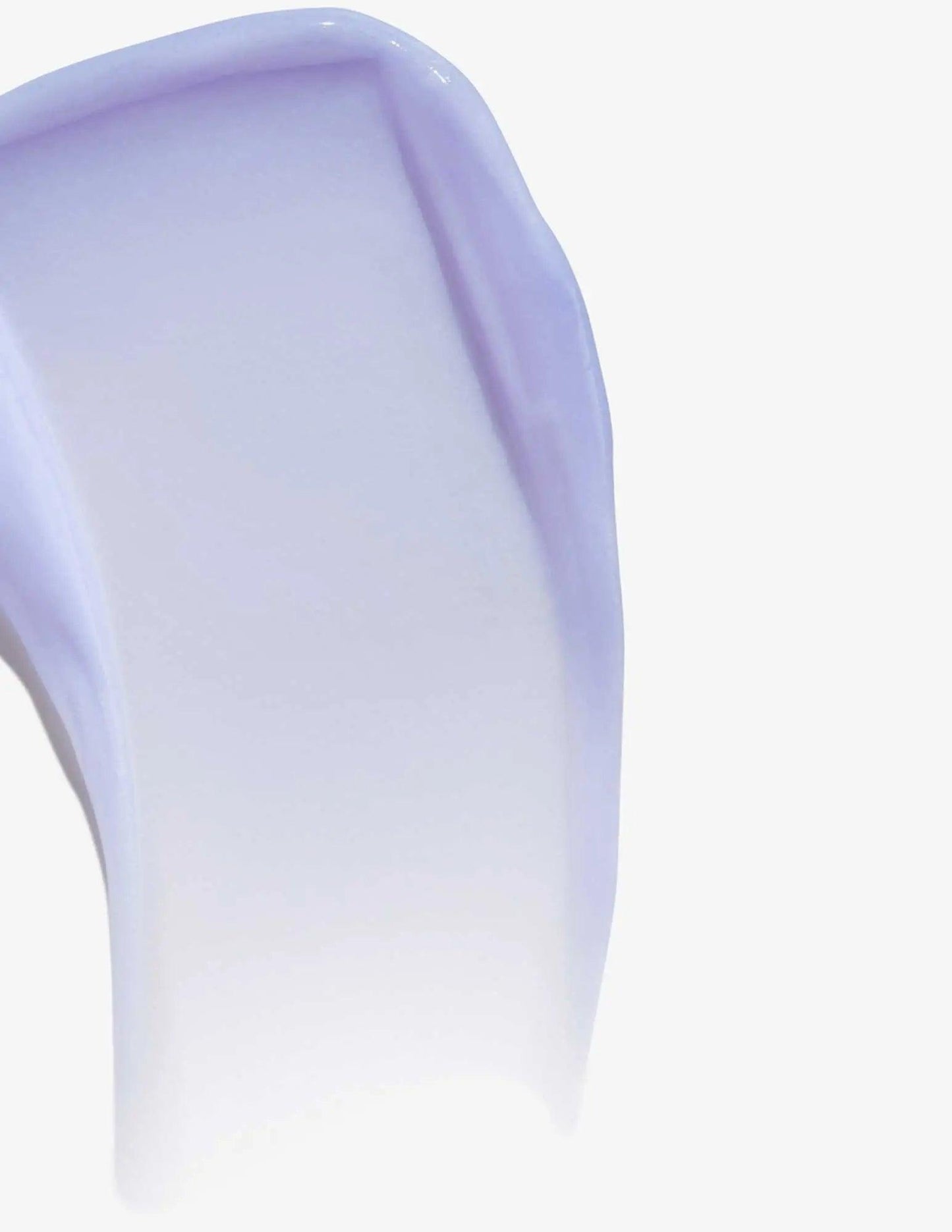 Smooth application of purple Redken Color Extend Blondage Conditioner for blonde and highlighted hair.