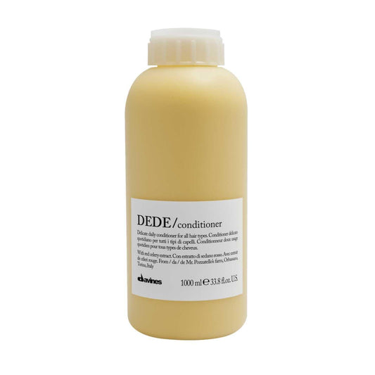 Davines Essential Haircare DEDE Conditioner 1000ml in a yellow bottle for lightweight moisturizing for fine hair.