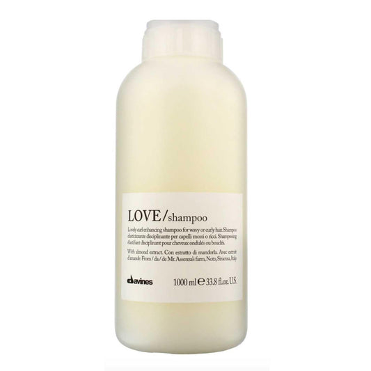 Davines Essential Haircare LOVE Curl Shampoo liter bottle for wavy or curly hair, enhancing volume and shine.