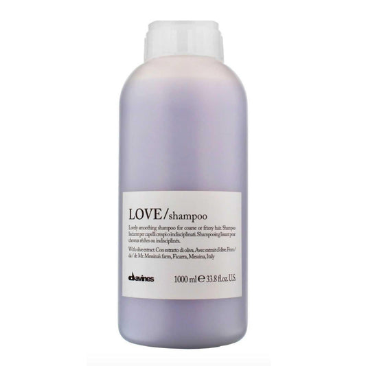 Davines Essential Haircare LOVE Smoothing Shampoo 1000ml bottle for frizzy hair with gentle cleansing and anti-frizz benefits.