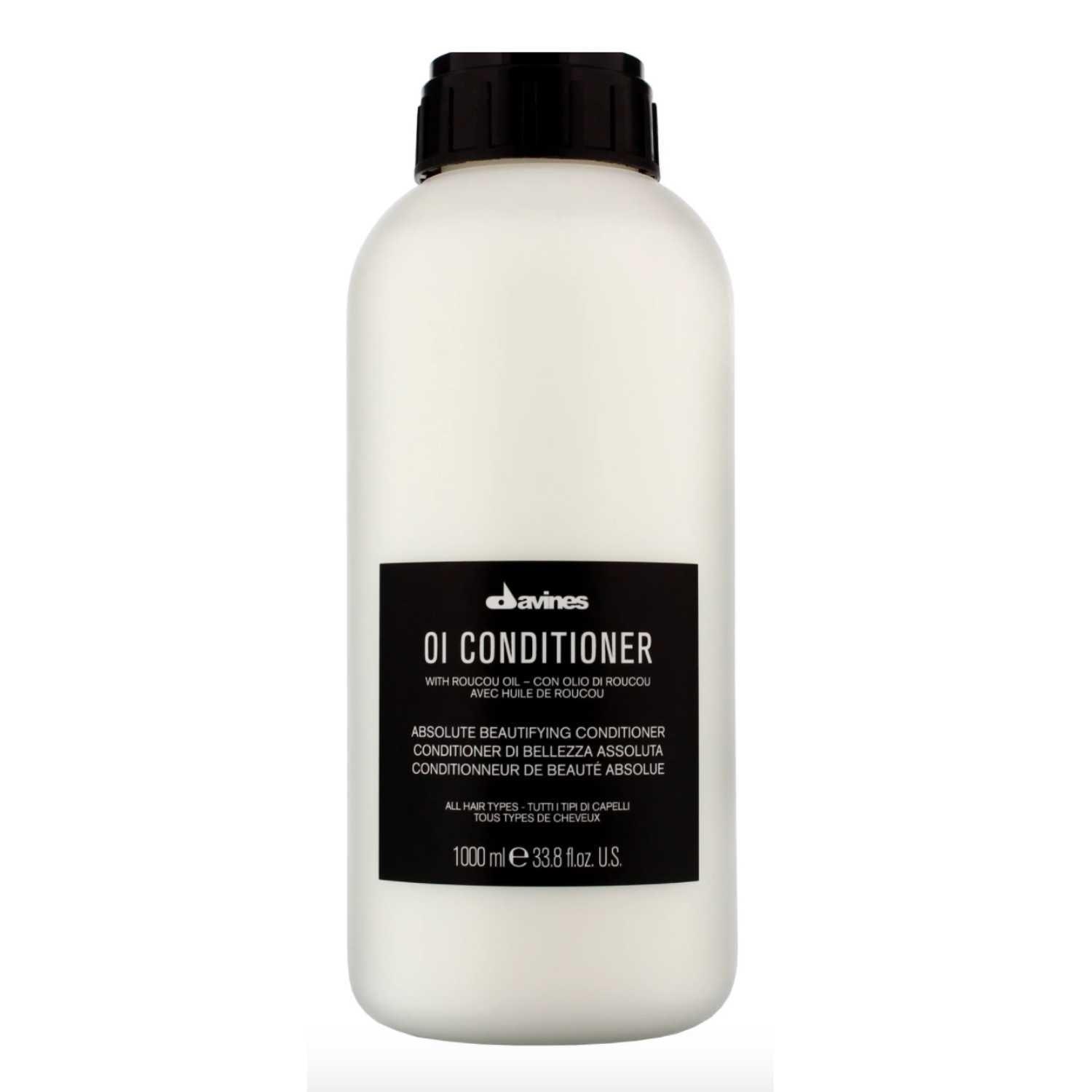 Davines Essential Haircare OI Conditioner in a 1000ml bottle, nourishing and enhancing hair softness and shine.