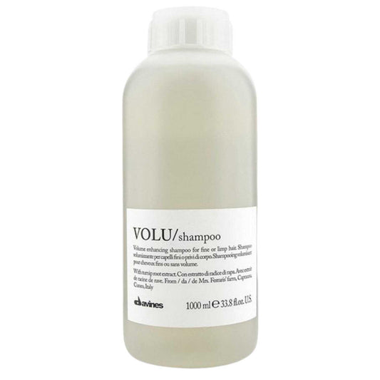 Davines Essential Haircare VOLU Shampoo 1000ml for fine, limp hair, enhances volume and softness with a light, foamy formula.