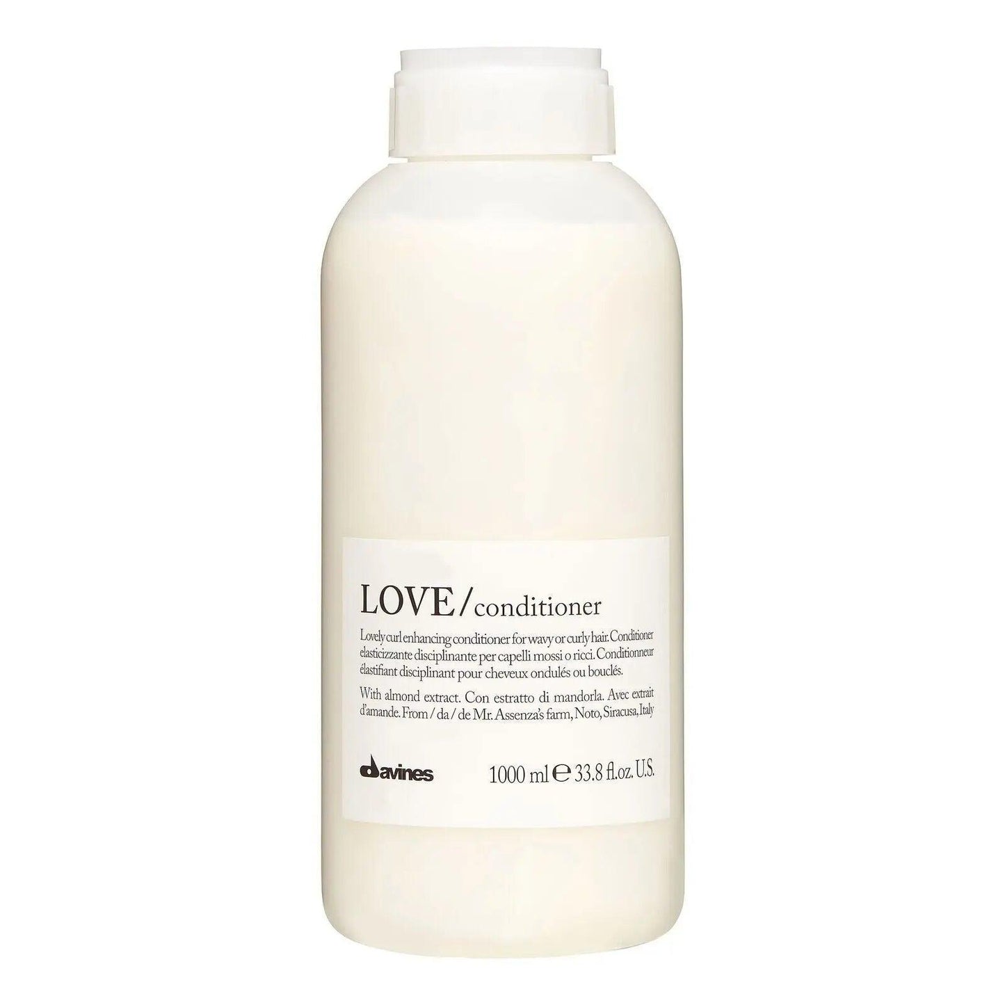 Davines Love Conditioner 1L for curly hair, enhancing softness, volume, and shine while moisturizing and defining curls.