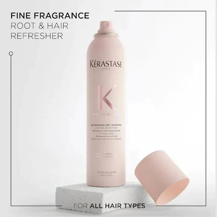 Kérastase fine fragrance root and hair refresher dry shampoo for all hair types in pink bottle with cap on white background