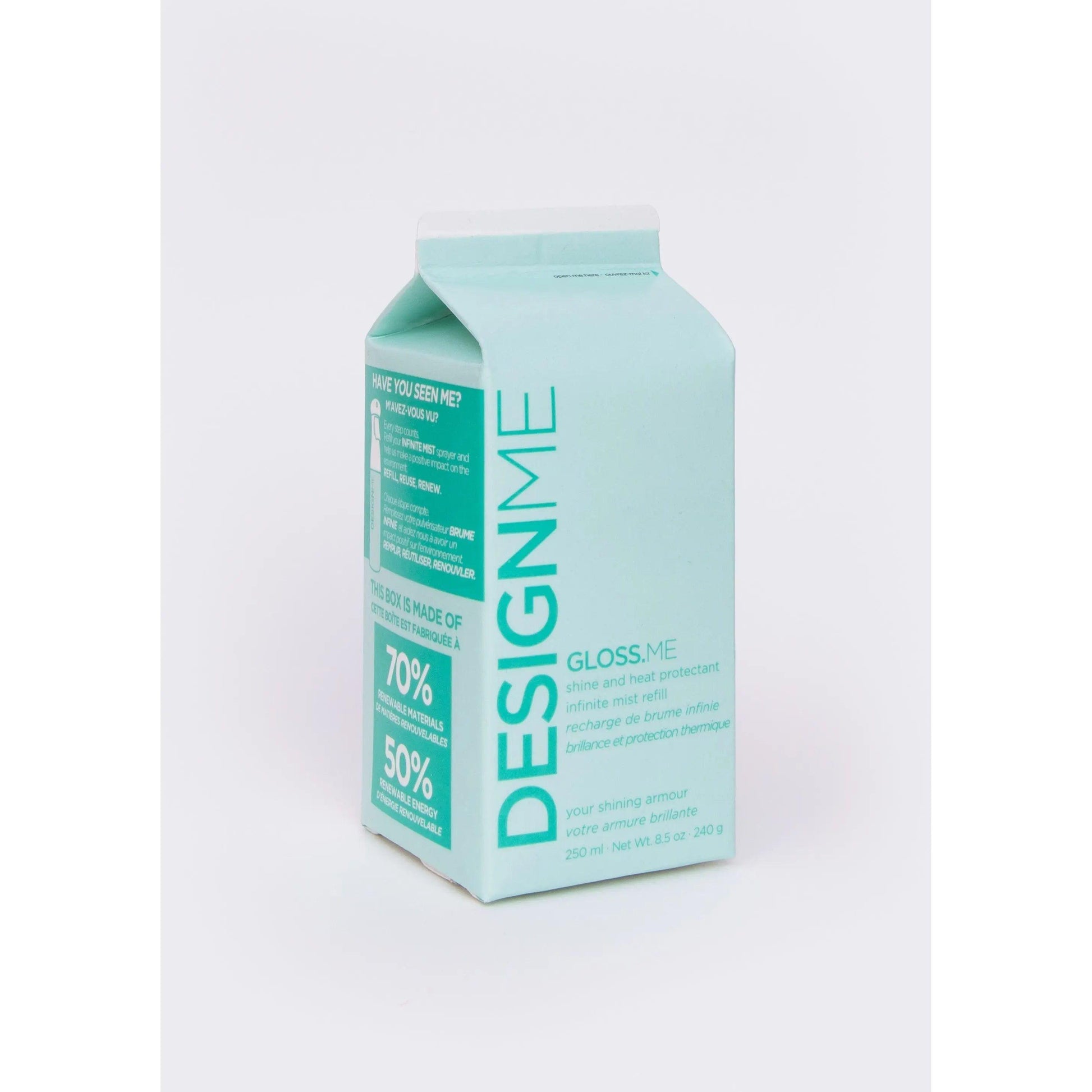 DESIGNME Gloss.Me hair serum in light teal milk carton packaging for shiny and hydrated hair.