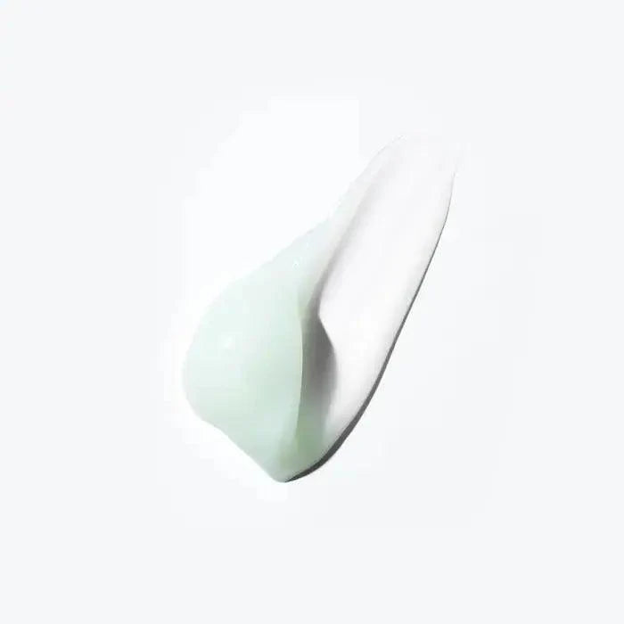 Kérastase Spécifique Masque Réhydratant hair mask swatch showing creamy texture for hydration and scalp nourishment.