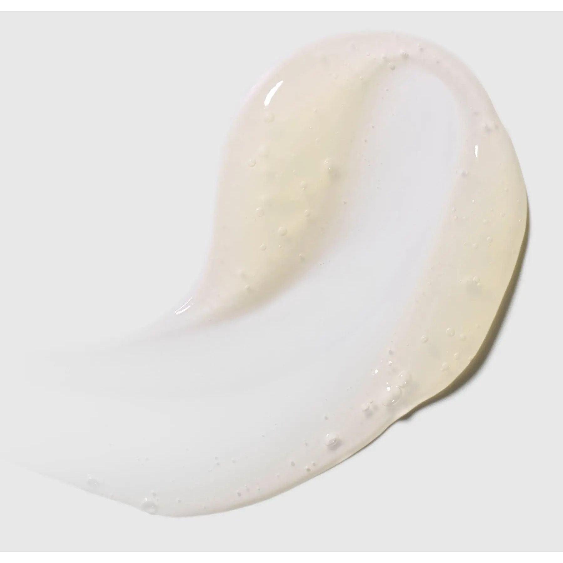 Clear hydrating serum applied on skin for skincare routine.