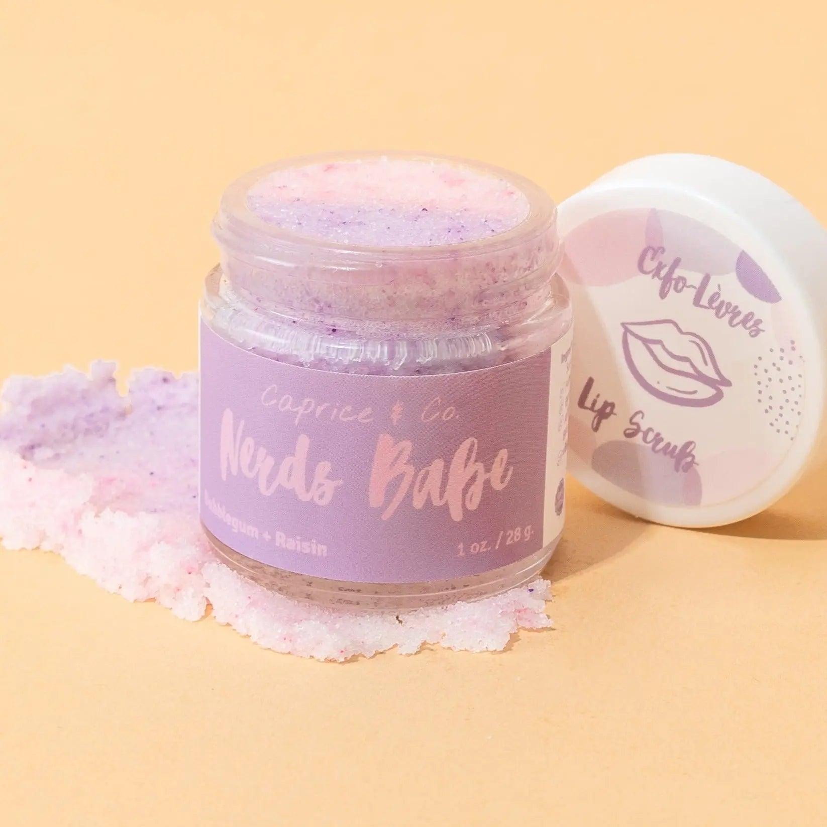 Nerds Babe Lip Scrub 1oz in bubblegum and grape flavor, featuring a cute container and exfoliating sugar texture.