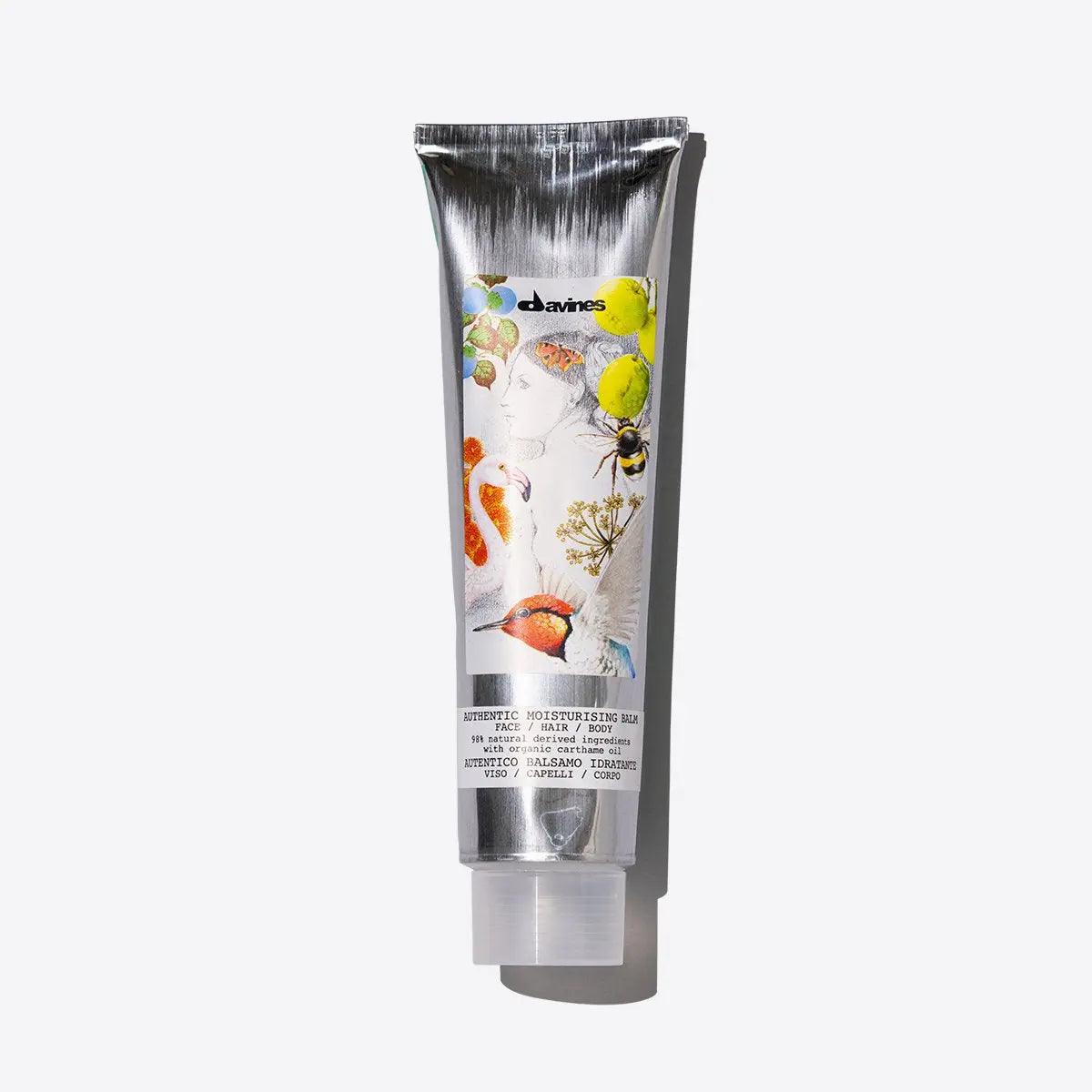 Moisturizing balm tube featuring colorful illustrations, ideal for softening skin and hair while removing makeup.
