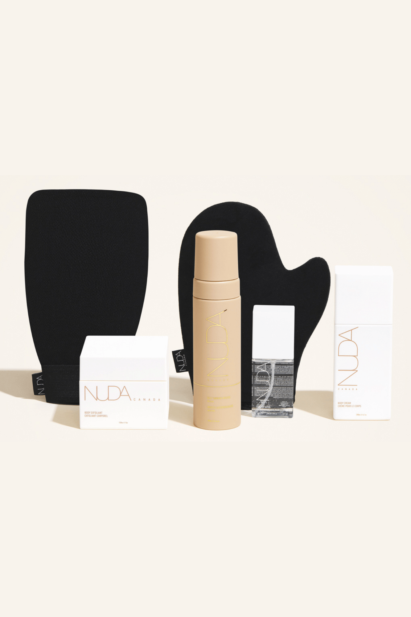 Deluxe Routine Kit featuring self tanning mousse, exfoliating mitt, and body cream for a radiant tan.