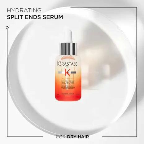 Kérastase Nutri-Supplement Split Ends Serum bottle on a plate, designed for hydrating dry hair and preventing split ends.