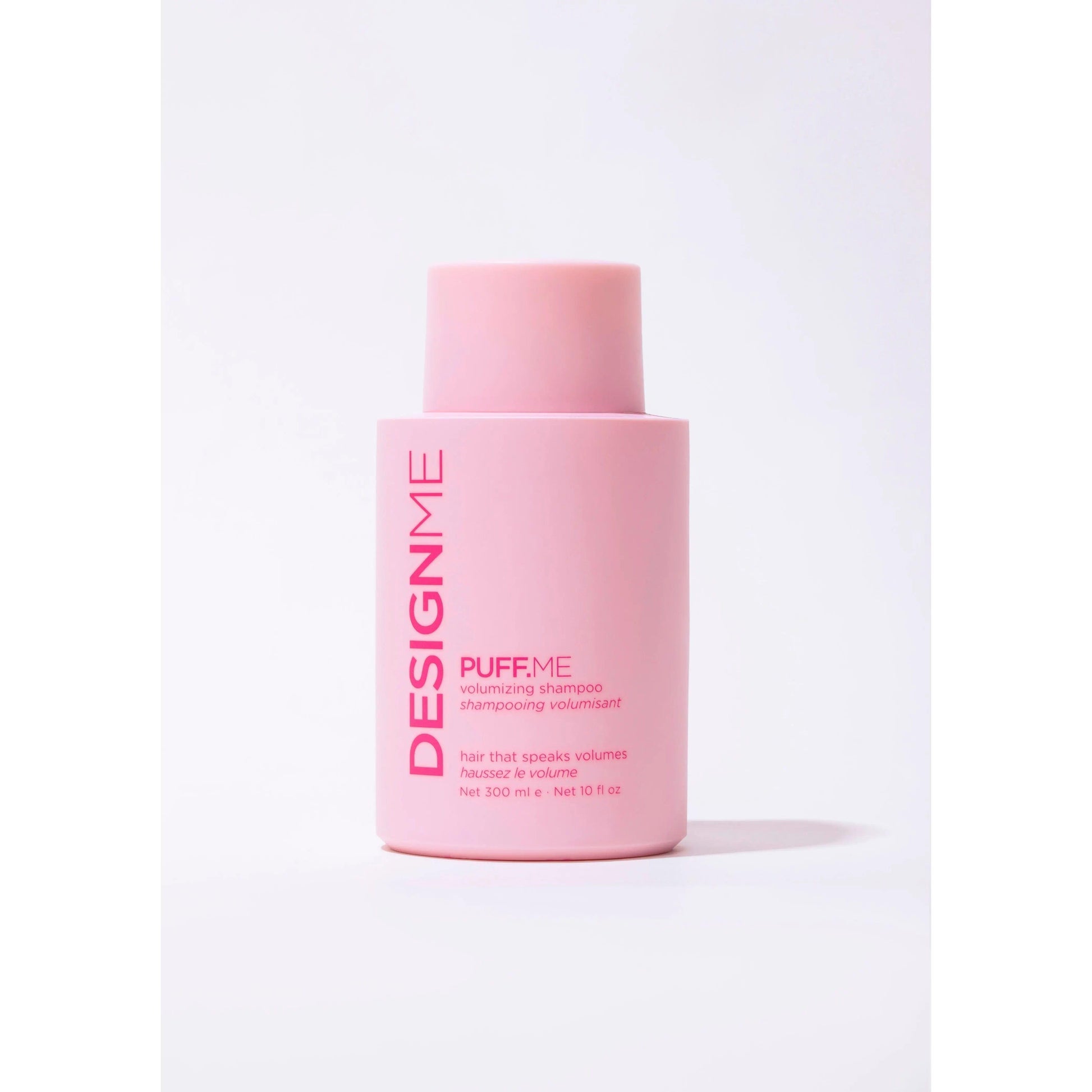 DESIGNME Puff.Me volumizing shampoo for thicker, fuller hair in a 300ml pink bottle.