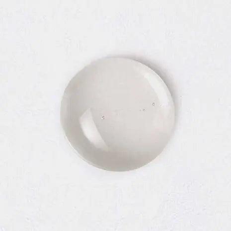 Small round dish in a smooth white finish, perfect for serving or display.