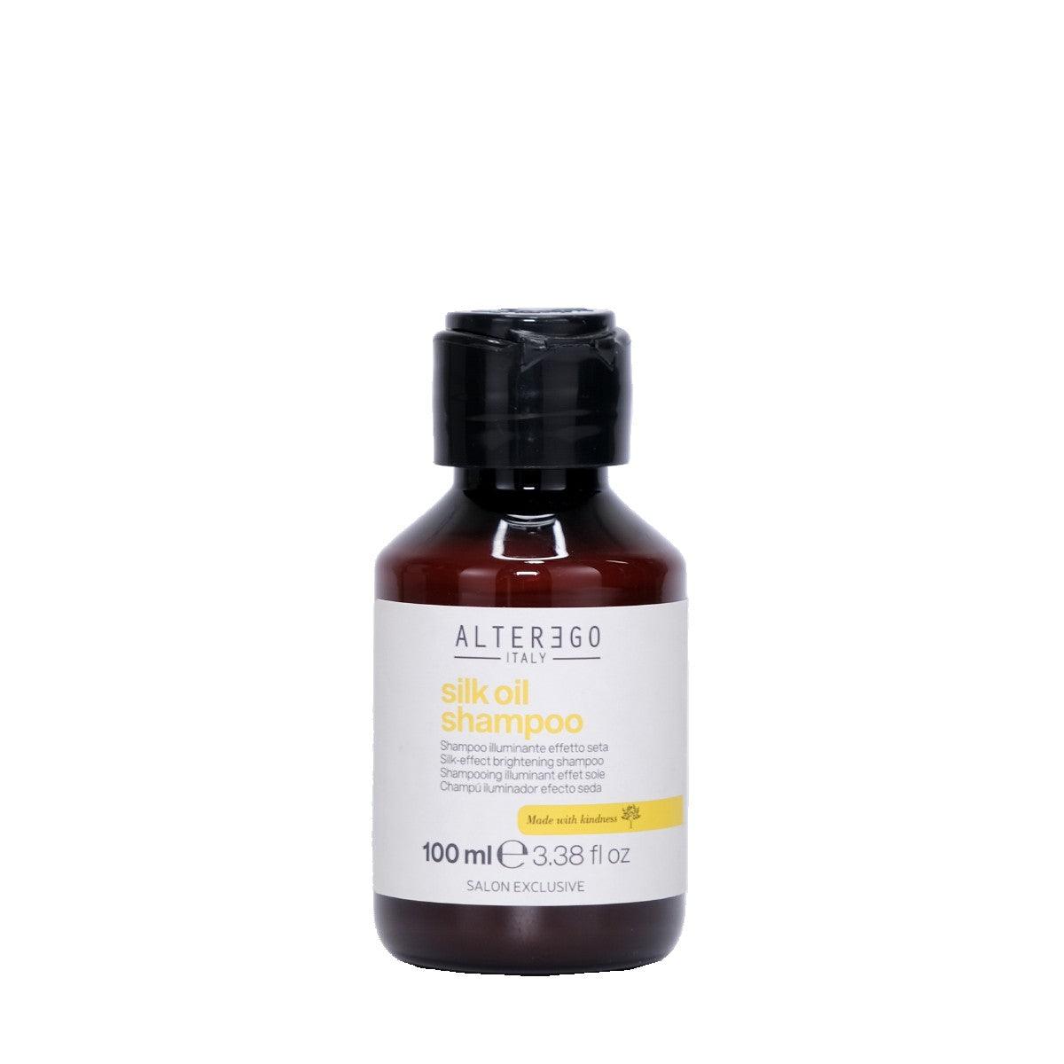 Silk Oil Shampoo bottle for frizzy hair, containing Argan and Coconut oils, 100ml size, salon exclusive formula.