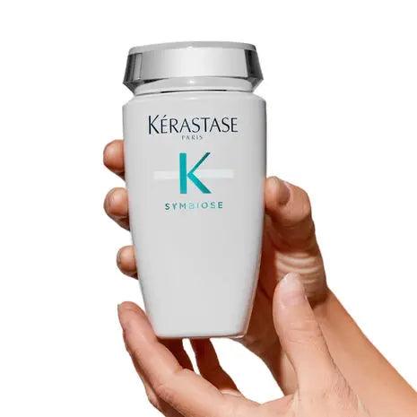 Kérastase Symbiose Bain Crème Apaisant shampoo bottle for soothing sensitive scalps.