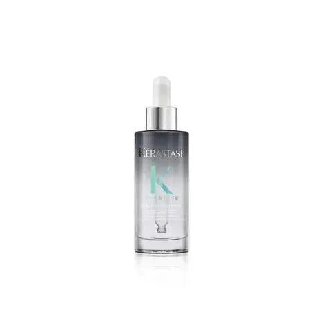 Kérastase Symbiose Sérum Nuit Intensif in a dropper bottle, designed for rejuvenating damaged hair overnight.