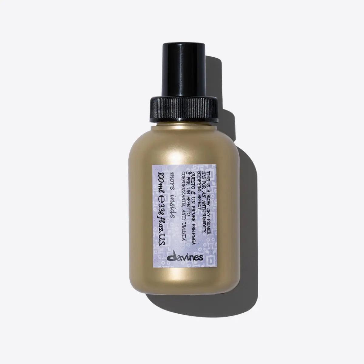 Davines Blow Dry Primer bottle, a leave-in spray for heat protection, shine enhancement, and anti-humidity support.