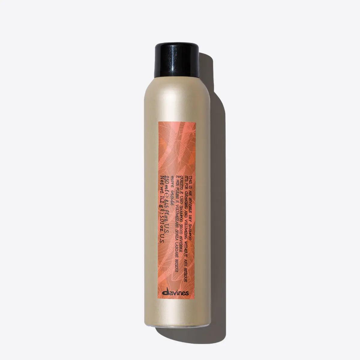 Invisible dry shampoo bottle by Davines, designed to refresh and volumize hair without residues.