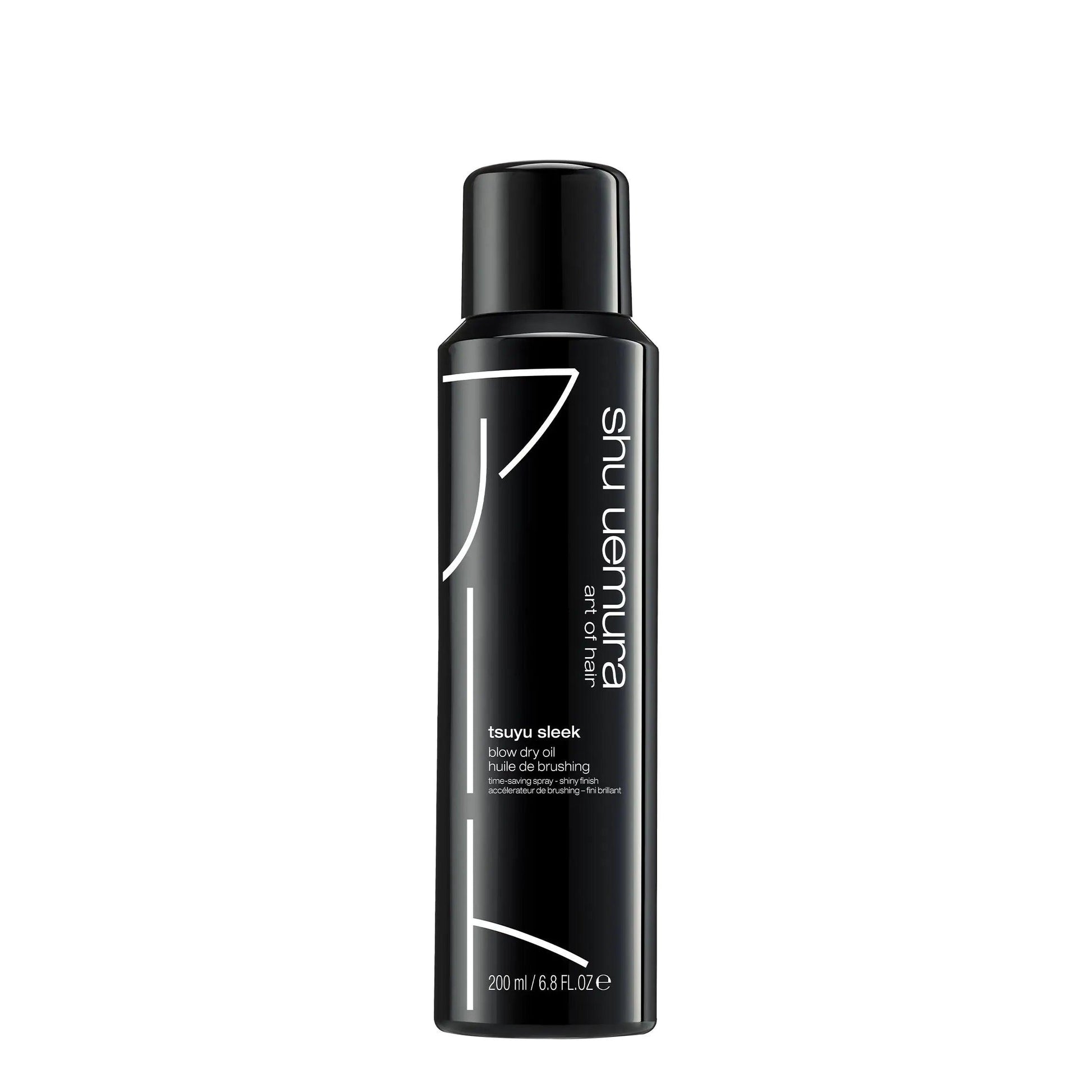Tsuyu Sleek Blow Dry Hair Oil by Shu Uemura in a 200ml bottle for smoothing frizz and enhancing shine.