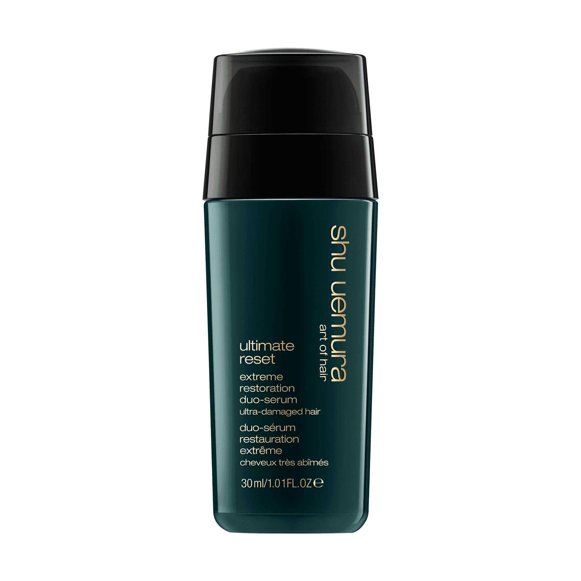 Shu Uemura Ultimate Reset Serum for extremely damaged hair in a sleek green bottle. Ideal for all textures.