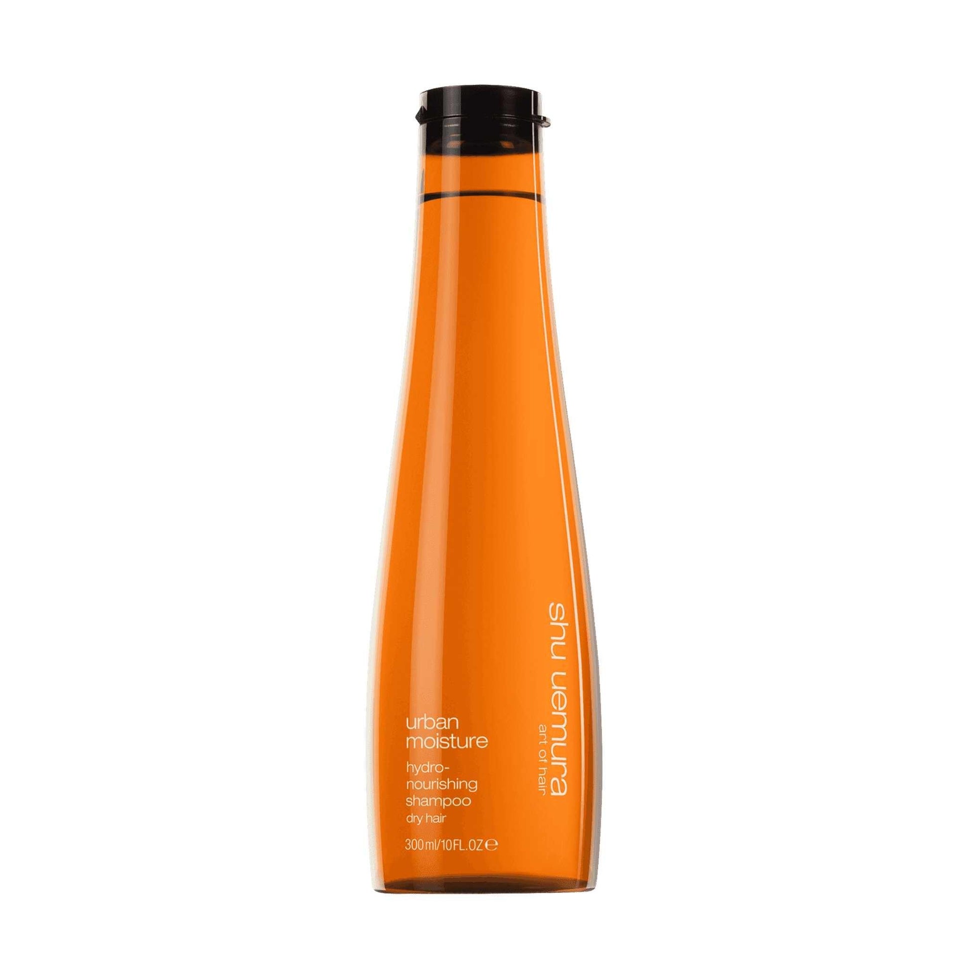 Shu Uemura Urban Moisture Shampoo bottle, hydrating formula for dry hair, 300ml size with a vibrant orange color.