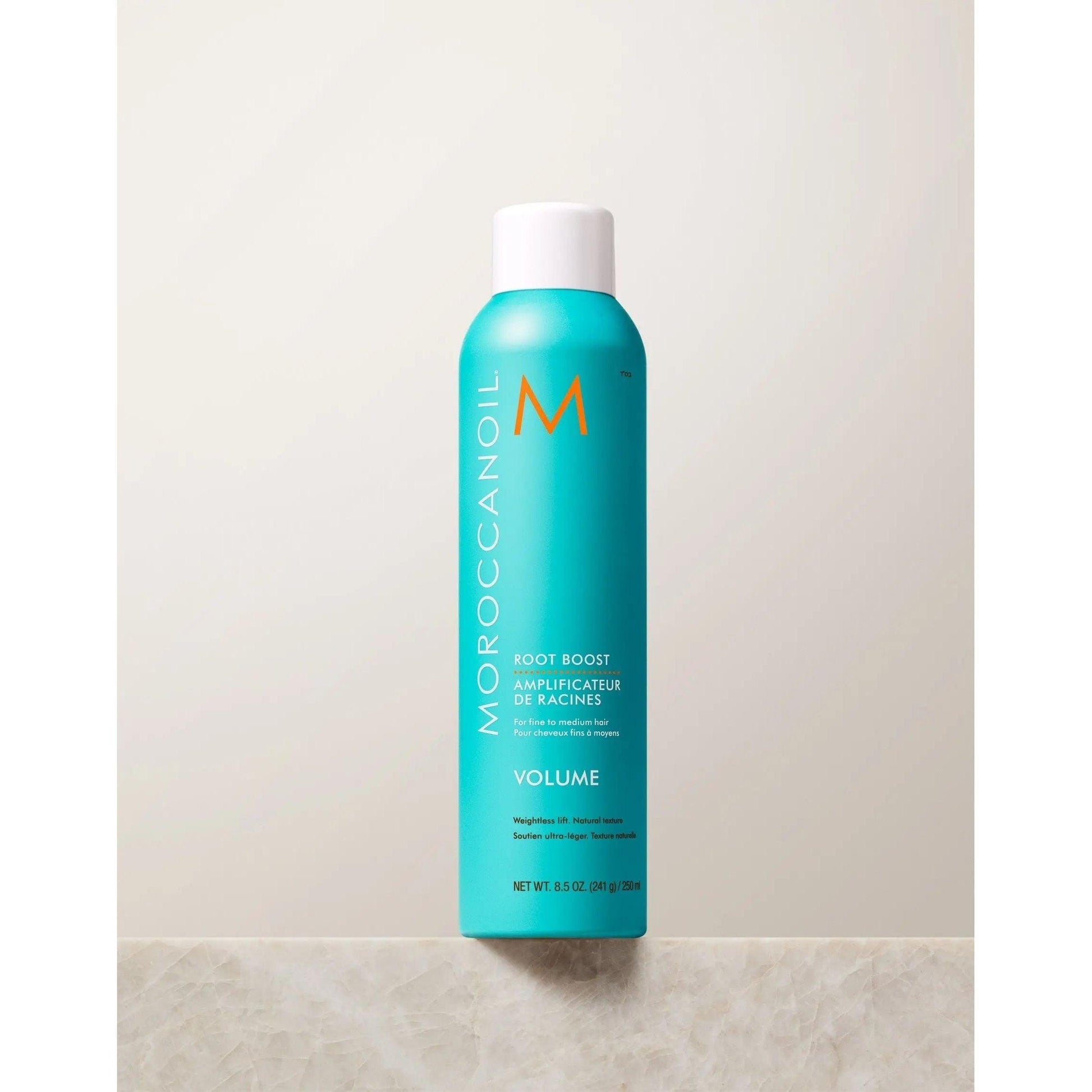 Moroccanoil Root Boost spray for root lift and volume, infused with argan oil for textured, body-full hair.