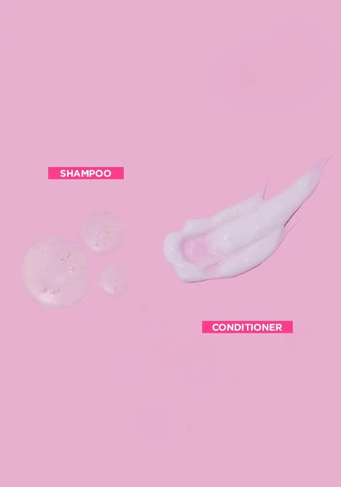 Shampoo and conditioner swatches on a pink background, showcasing the creamy textures for volumizing hair care.