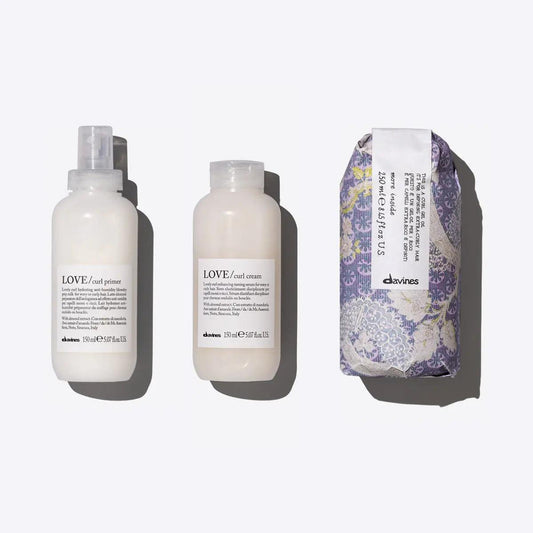 Voluminous Curls Set featuring LOVE CURL Primer, Cream, and This is a Curl Gel Oil for defined, shiny curls.