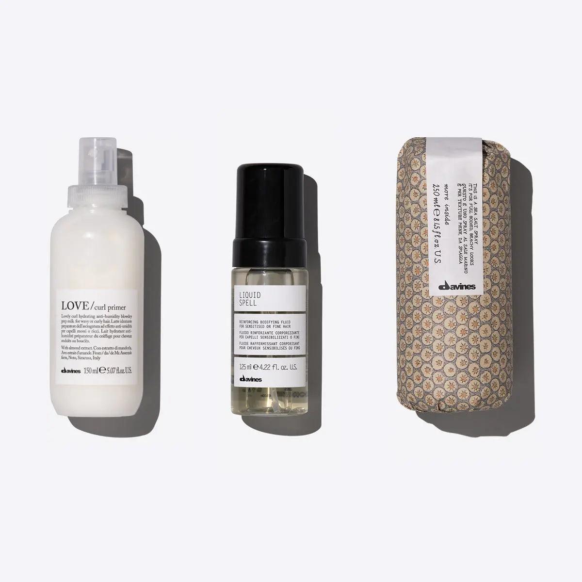 Voluminous Waves Set featuring LOVE CURL Primer, Liquid Spell treatment, and texturizing product for enhanced wavy hair.