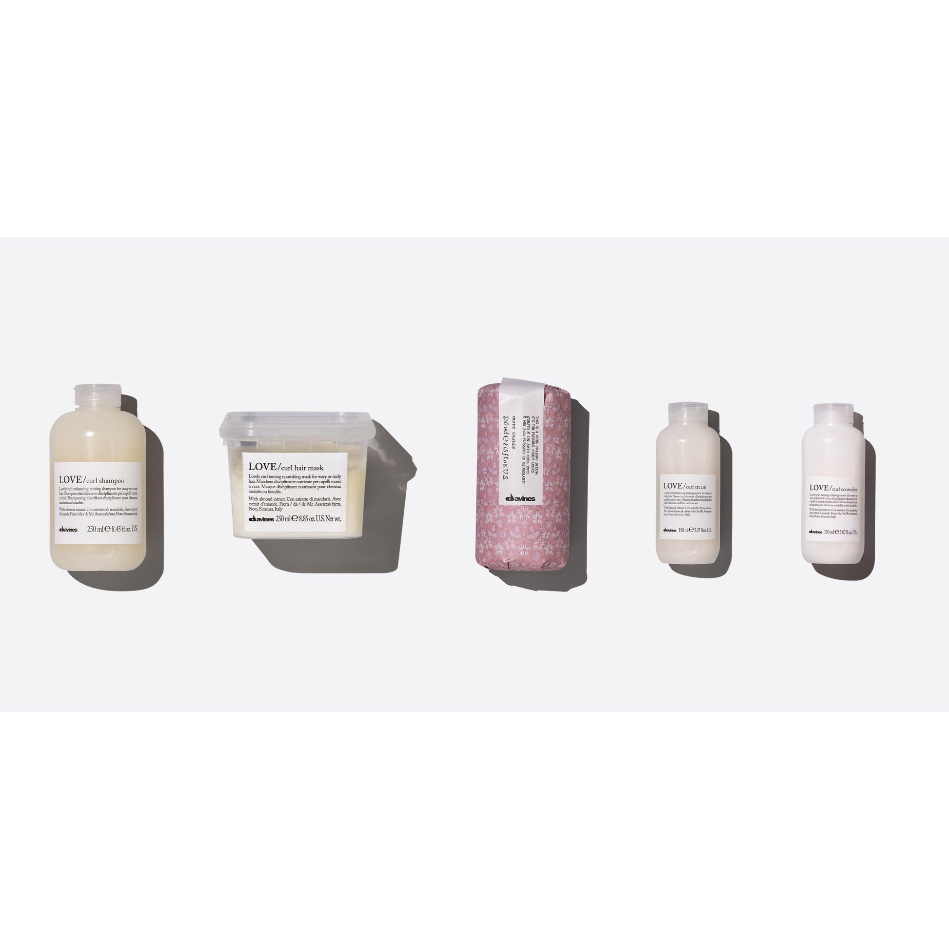 Wash & Go Curls Set featuring LOVE Curl Shampoo, Mask, Building Serum, Cream, and Controller for effortless curls.