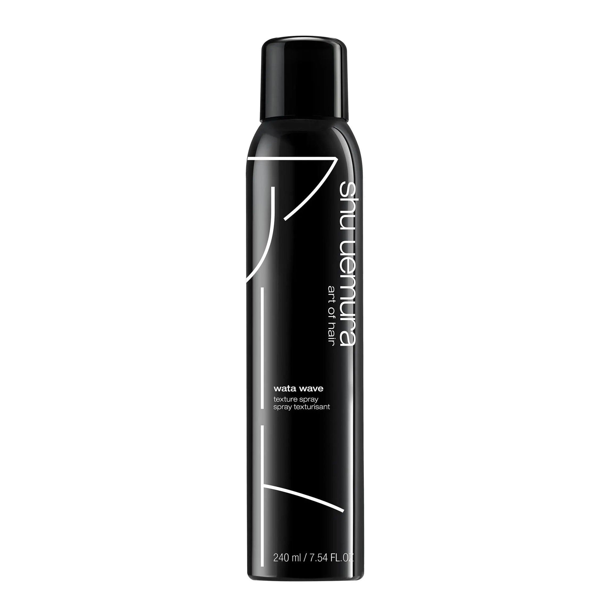Wata Wave Dry Texturizing Hair Spray by Shu Uemura in a sleek black can, enhancing natural waves and curls for all hair types.