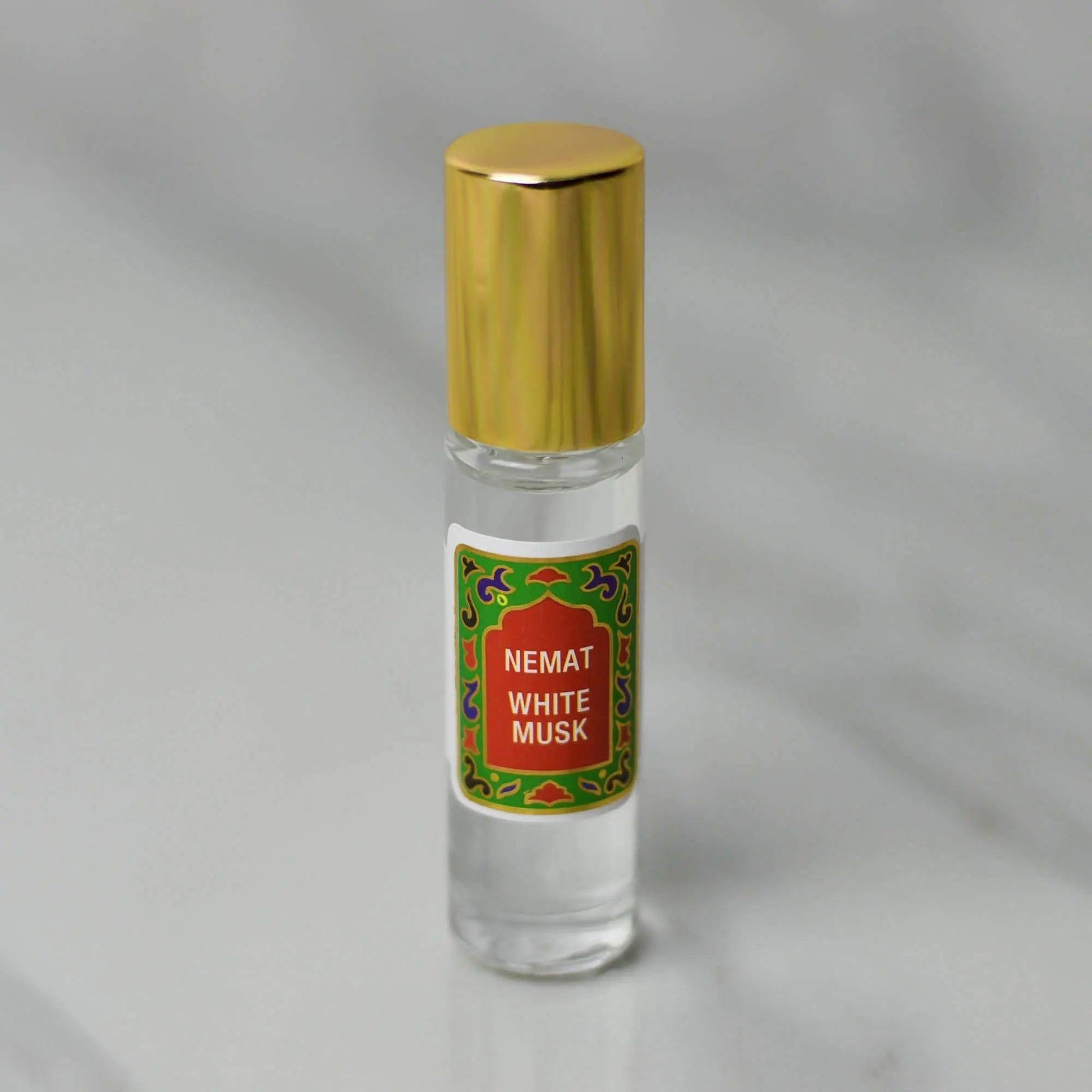 10 ml roll-on bottle of Nemat White Musk perfume showcasing its elegant design and subtle fragrance.