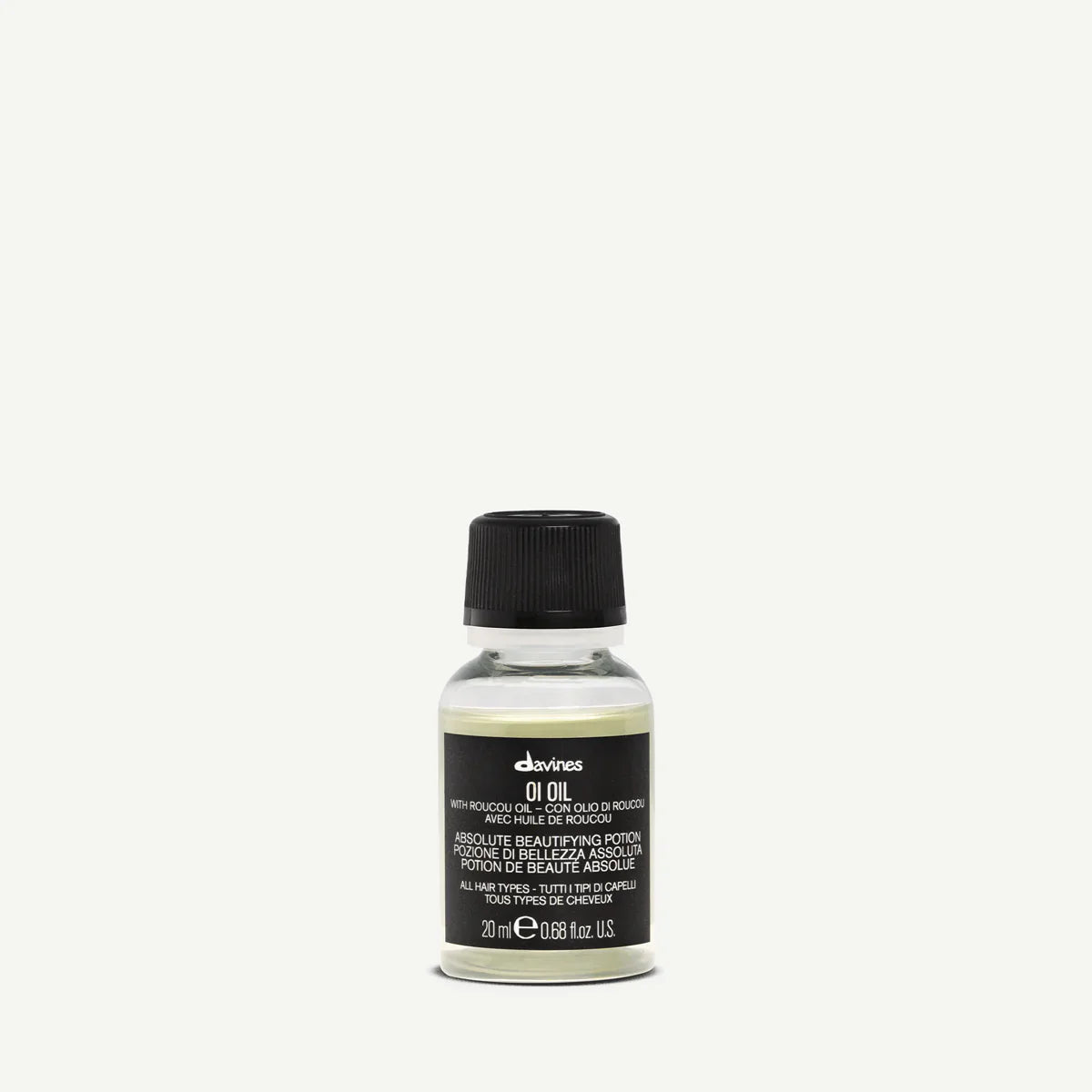 Oi Oil 20mL bottle by Davines, a trial size product free with $75 online purchase, while supplies last.