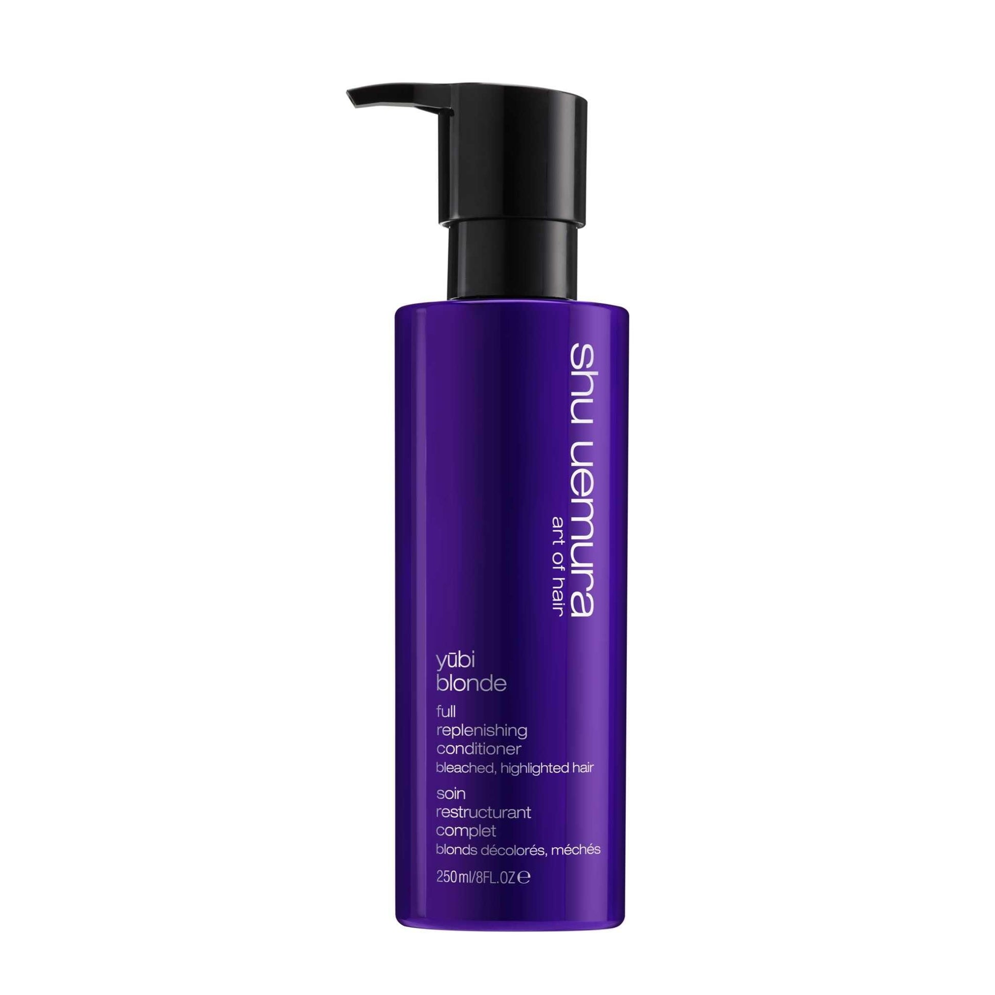 Yūbi Blonde Full Replenishing Conditioner by Shu Uemura in a purple bottle, designed for nourishing blonde hair.