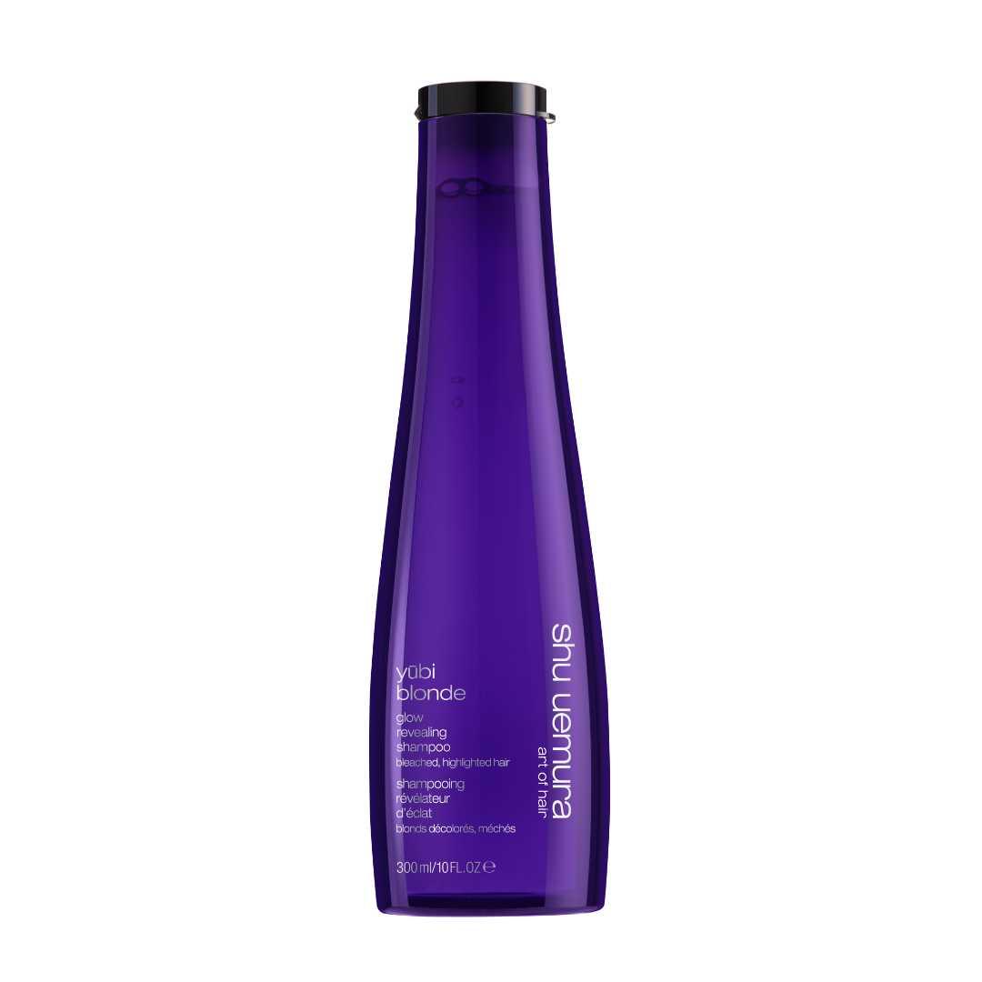 Yūbi Blonde Glow Revealing Shampoo in a sleek purple bottle, designed to brighten and enhance blonde hair.