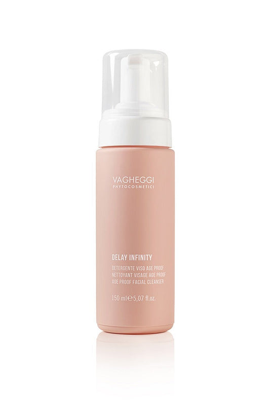 Delay Infinity Age Proof Facial Cleanser in a pink bottle, enriched with nourishing ingredients for gentle skin care.