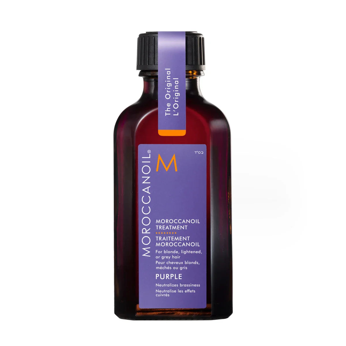 Moroccanoil Purple Oil Treatment bottle for neutralizing brassiness in blonde and gray hair, enhancing shine and moisture.