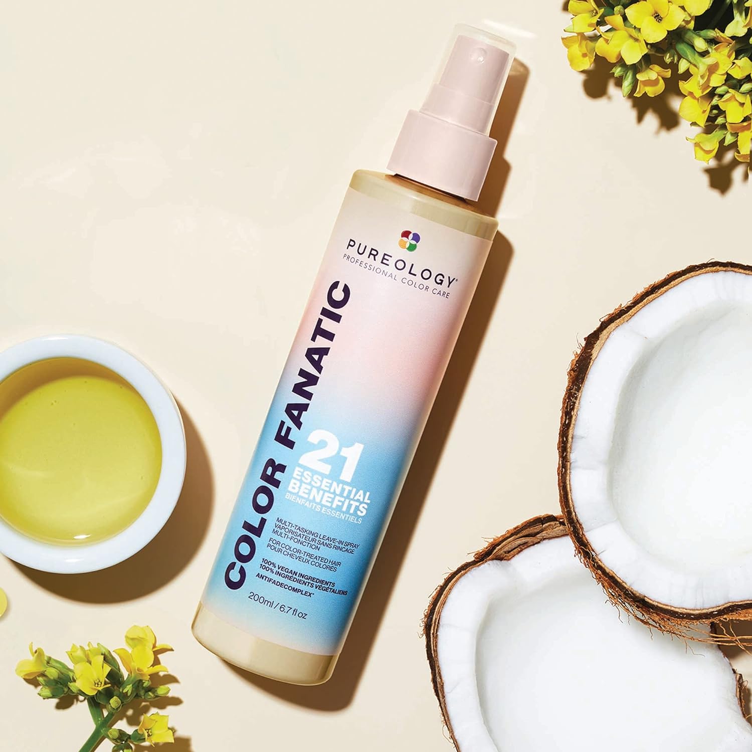 Pureology Colour Fanatic Leave-in Treatment Spray with 21 essential benefits for color-treated hair on a light background.